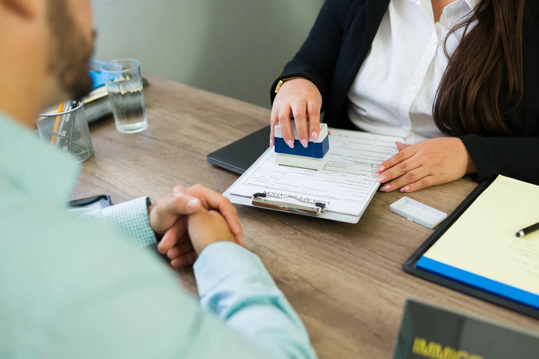 Immigration law professionals reviewing documents